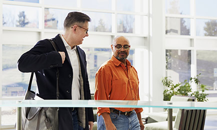 Partners walking through lobby